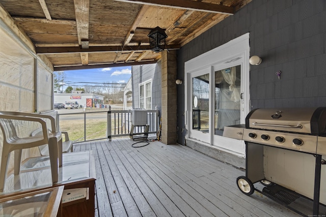 wooden deck with area for grilling