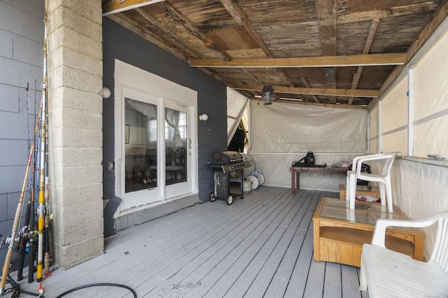 wooden terrace with area for grilling