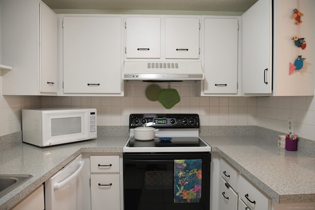 84 Shepards Knoll Dr Unit 84, Hamden, CT 06514 - kitchen featuring under cabinet range hood, light countertops, white appliances, decorative backsplash, and white cabinetry