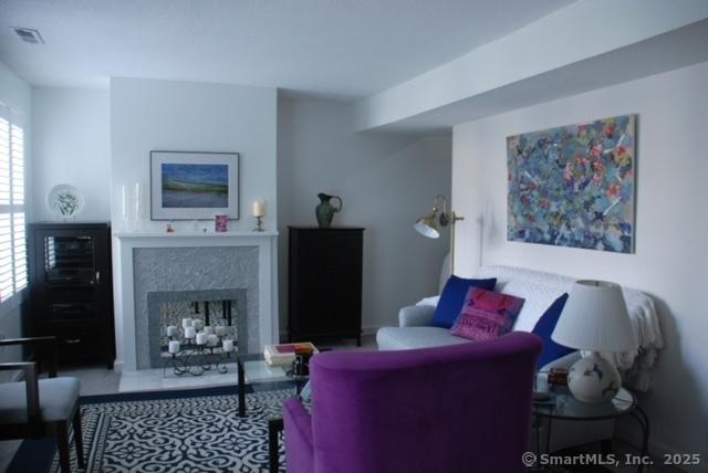 84 Shepards Knoll Dr Unit 84, Hamden, CT 06514 - living room with a premium fireplace and visible vents
