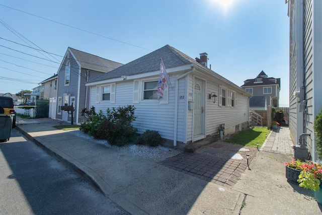 102 Broadway, Milford, CT 06460 - view of front of house featuring fence, a chimney, and a shingled roof