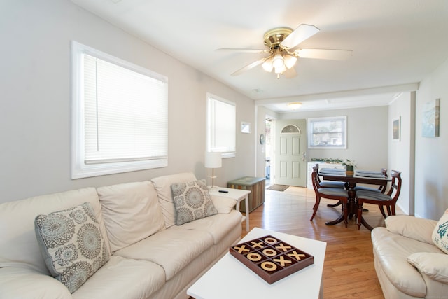 102 Broadway, Milford, CT 06460 - living room with light wood-style flooring and ceiling fan