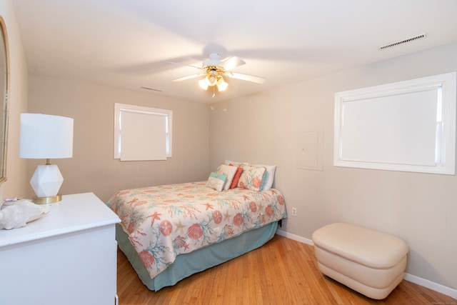 102 Broadway, Milford, CT 06460 - bedroom featuring visible vents, a ceiling fan, baseboards, and wood finished floors