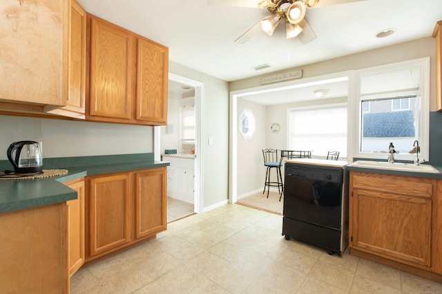 102 Broadway, Milford, CT 06460 - kitchen featuring visible vents, dark countertops, ceiling fan, a sink, and range