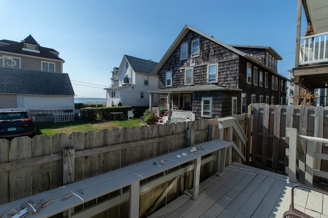 102 Broadway, Milford, CT 06460 - rear view of house featuring a fenced backyard and a wooden deck