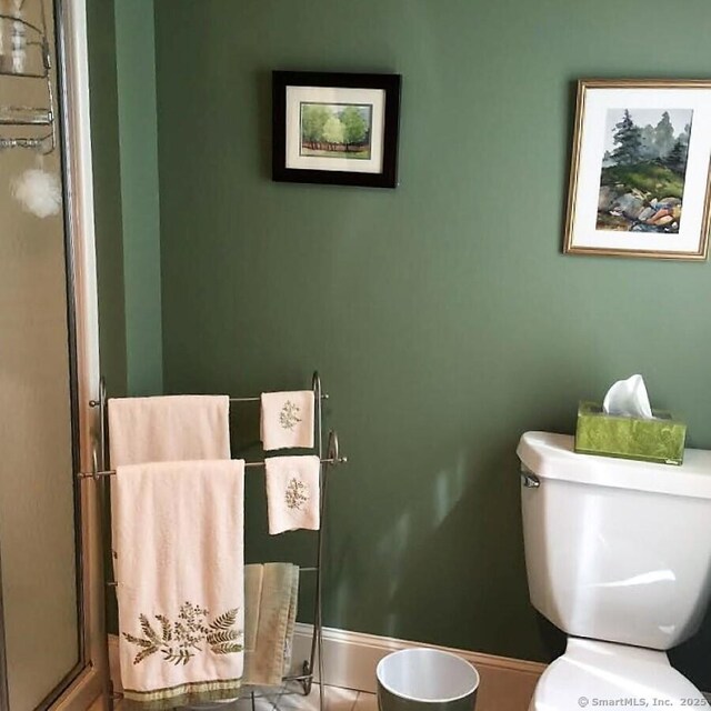 7 Beacon Ln, Norfolk, CT 06058 - bathroom featuring a stall shower and tile patterned flooring