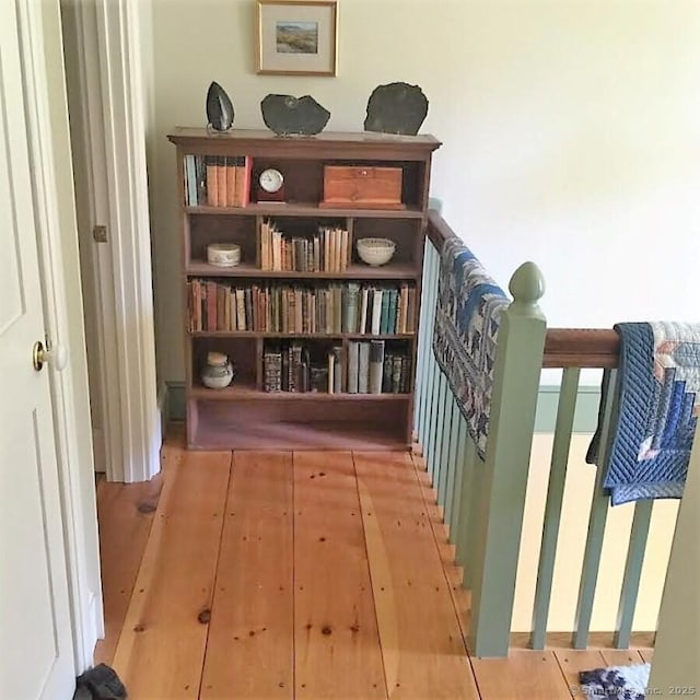 7 Beacon Ln, Norfolk, CT 06058 - hall with wood finished floors and an upstairs landing