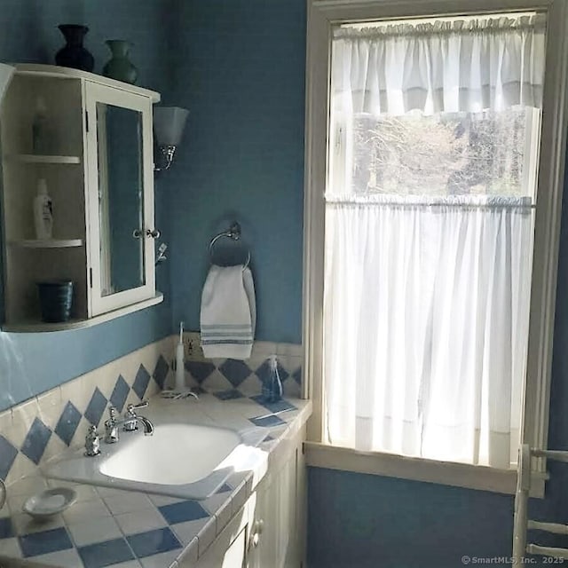 7 Beacon Ln, Norfolk, CT 06058 - bathroom with a wealth of natural light and vanity