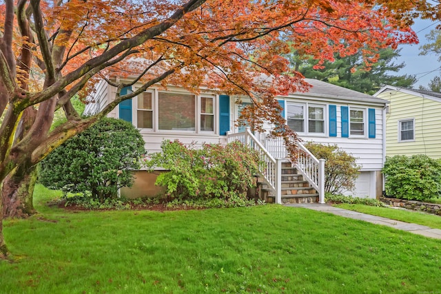 11 Arbor Dr, Norwalk, CT 06854 - view of front of house with a front lawn