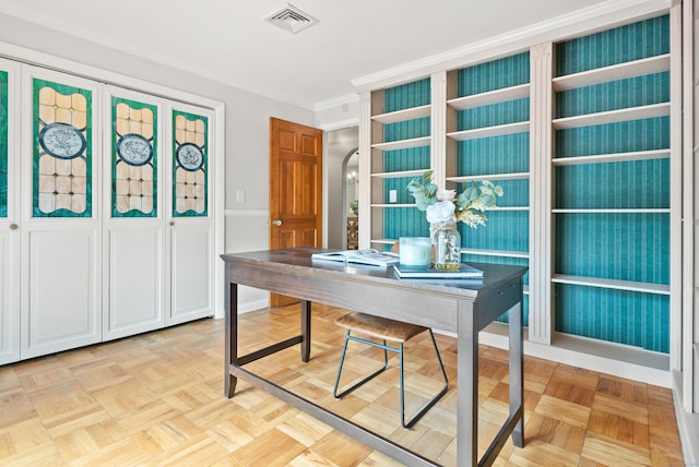 office with crown molding and visible vents