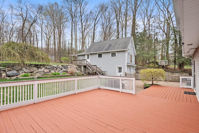 wooden deck featuring stairs