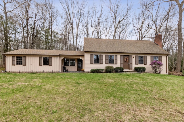 17 Fernwood Ln, Somers, CT 06071 - ranch-style house with a front lawn, a shingled roof, and a chimney