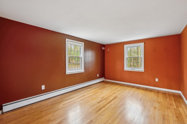 17 Fernwood Ln, Somers, CT 06071 - unfurnished room with baseboards, wood finished floors, and a baseboard radiator