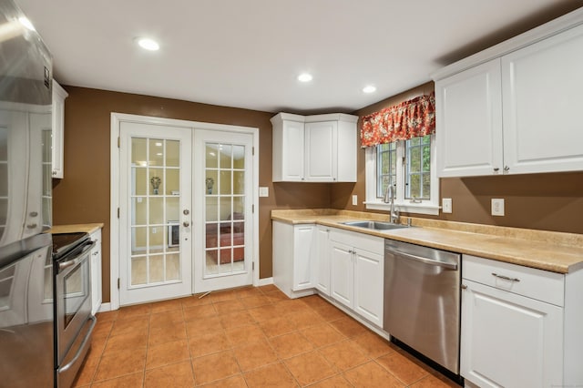 17 Fernwood Ln, Somers, CT 06071 - kitchen featuring a sink, french doors, stainless steel appliances, and light countertops