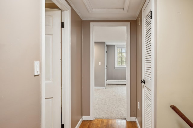 17 Fernwood Ln, Somers, CT 06071 - corridor with baseboards, attic access, light wood-style floors, and a baseboard radiator