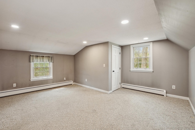 17 Fernwood Ln, Somers, CT 06071 - bonus room featuring lofted ceiling, a baseboard radiator, carpet flooring, and baseboards