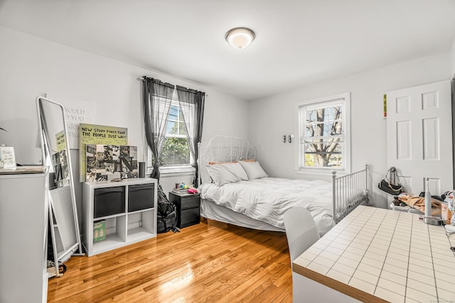 bedroom featuring light wood-type flooring