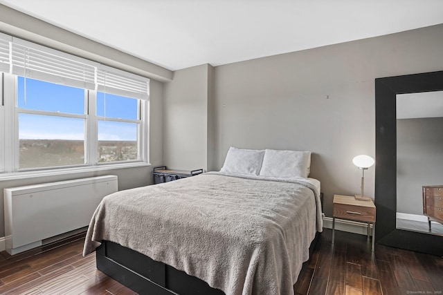 2625 Park Ave Phj, Phj, Bridgeport, CT 06604 - bedroom featuring radiator heating unit, baseboards, and dark wood-style flooring