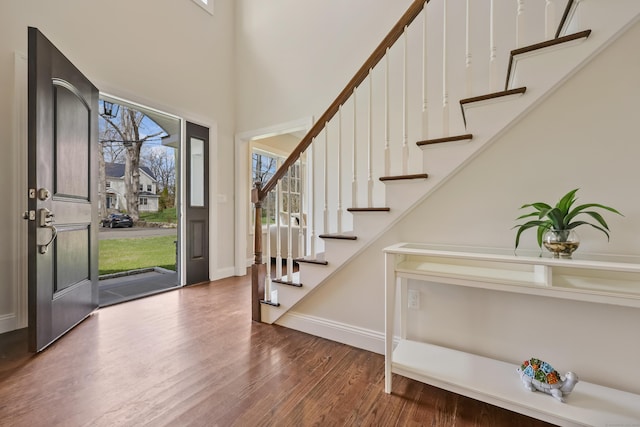 52 Morningside Dr, Greenwich, CT 06830 - foyer entrance with wood finished floors, stairs, and a towering ceiling