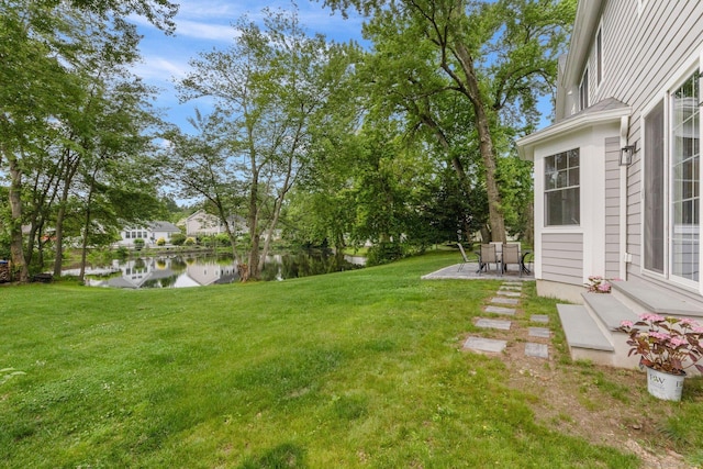 52 Morningside Dr, Greenwich, CT 06830 - view of green lawn with a water view and a patio