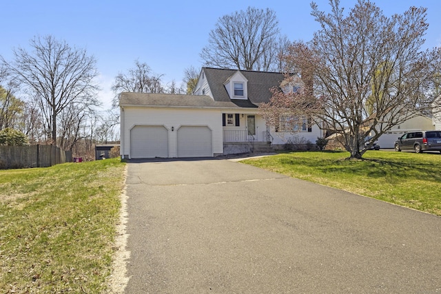 87 Summit St, Newington, CT 06111 - cape cod-style house featuring fence, a garage, a front yard, and driveway