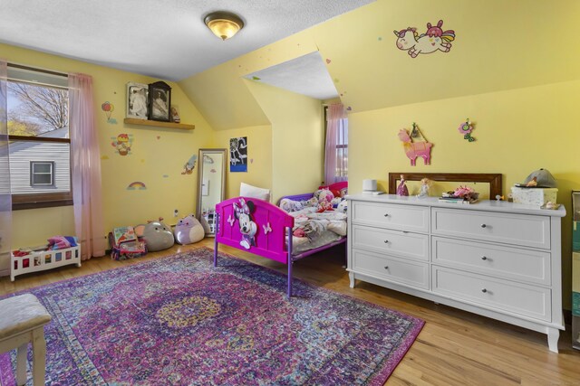 87 Summit St, Newington, CT 06111 - bedroom featuring light wood-style flooring and vaulted ceiling
