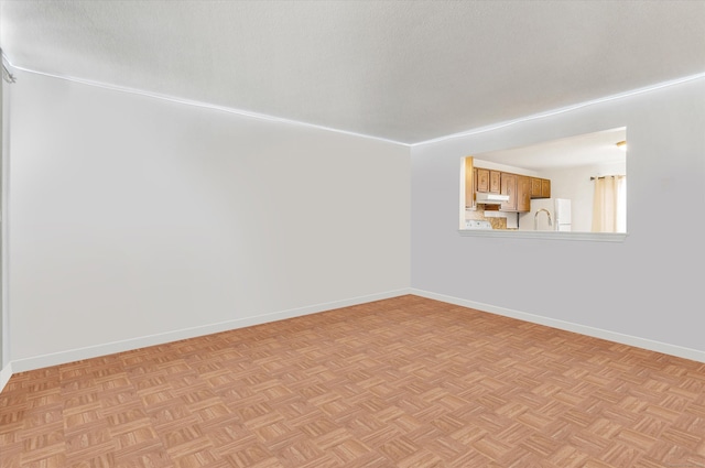 121-123 Sumac St, Waterbury, CT 06704 - unfurnished living room featuring baseboards