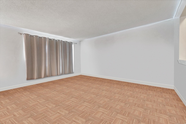 121-123 Sumac St, Waterbury, CT 06704 - unfurnished room with baseboards and a textured ceiling