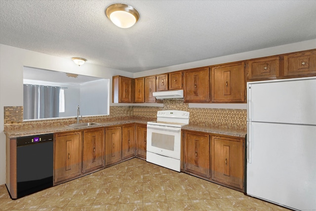 121-123 Sumac St, Waterbury, CT 06704 - kitchen featuring decorative backsplash, brown cabinets, a sink, under cabinet range hood, and white appliances