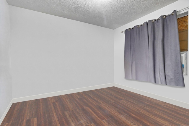 121-123 Sumac St, Waterbury, CT 06704 - unfurnished room featuring baseboards, a textured ceiling, and dark wood finished floors