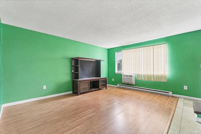 121-123 Sumac St, Waterbury, CT 06704 - unfurnished living room with a wall mounted AC, a baseboard heating unit, a textured ceiling, and wood finished floors