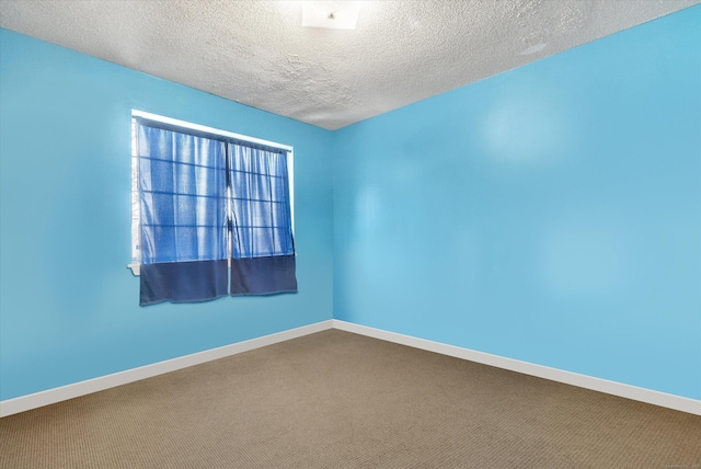 121-123 Sumac St, Waterbury, CT 06704 - empty room with baseboards, carpet flooring, and a textured ceiling