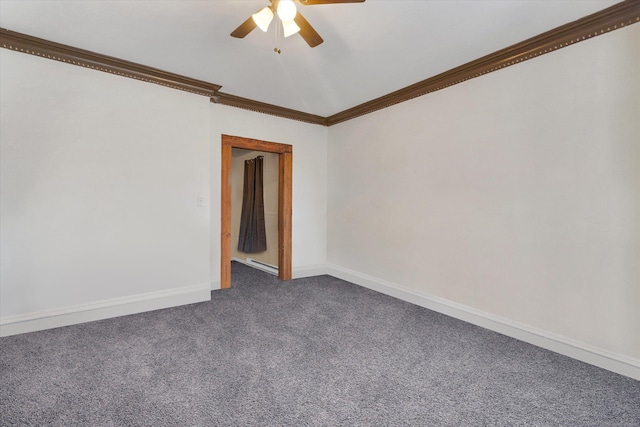 unfurnished room with vaulted ceiling, dark colored carpet, baseboards, a ceiling fan, and crown molding