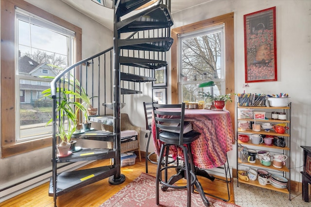 bar with stairway and wood finished floors
