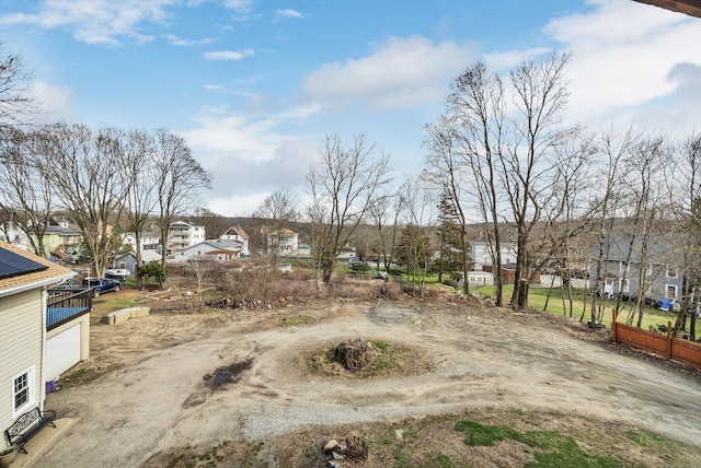 view of yard featuring a residential view
