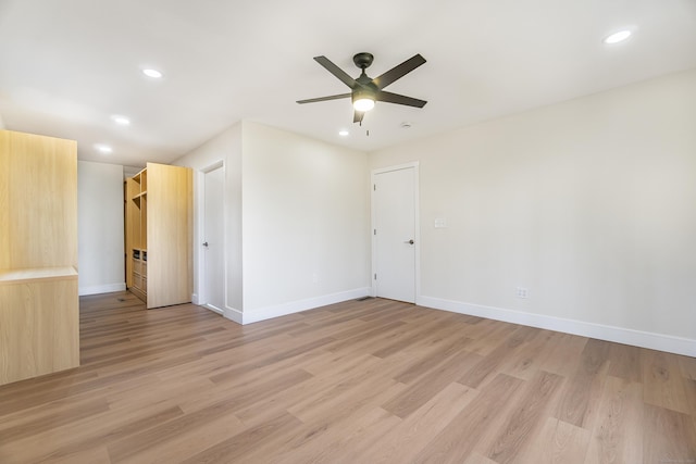 unfurnished room featuring light wood finished floors, recessed lighting, ceiling fan, and baseboards