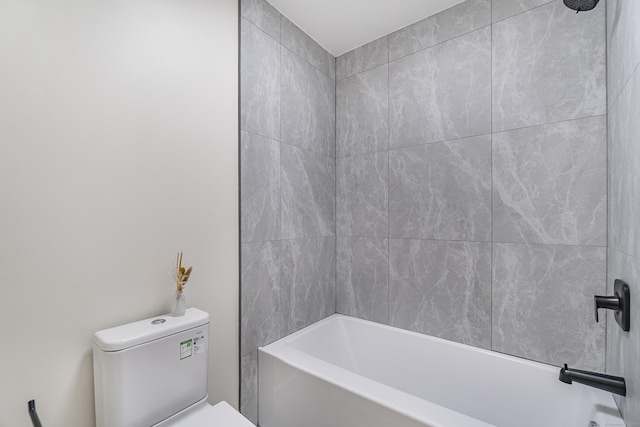 bathroom with toilet and bathtub / shower combination