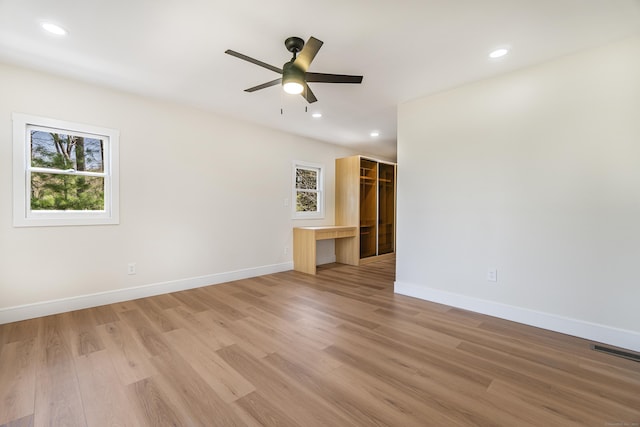 empty room with visible vents, ceiling fan, recessed lighting, and light wood finished floors