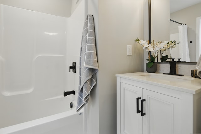 full bath featuring vanity and shower / bath combination with curtain