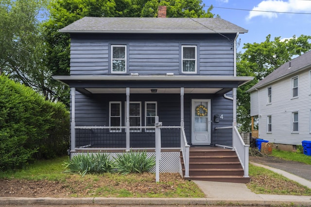 4 Glynn Ave, Middletown, CT 06457 - american foursquare style home featuring covered porch and a chimney