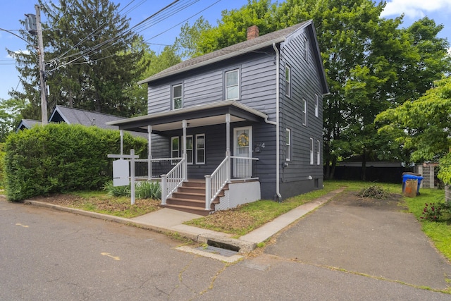 4 Glynn Ave, Middletown, CT 06457 - traditional style home with a chimney and covered porch