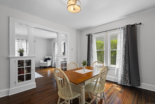 4 Glynn Ave, Middletown, CT 06457 - dining space with wood finished floors, ornate columns, and baseboards