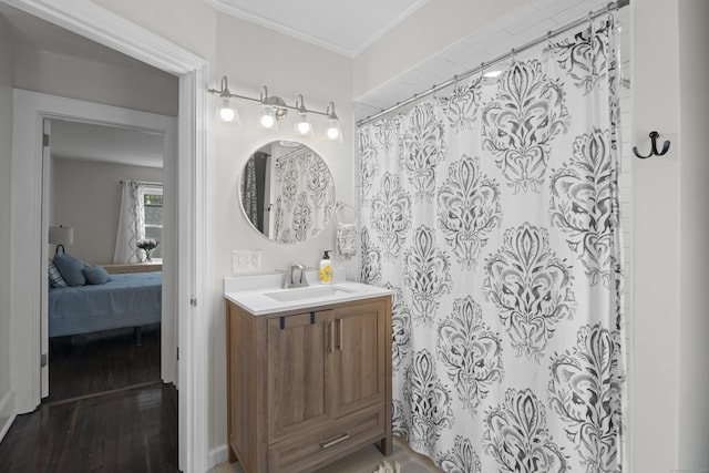 4 Glynn Ave, Middletown, CT 06457 - ensuite bathroom featuring vanity, wood finished floors, crown molding, and a shower with curtain