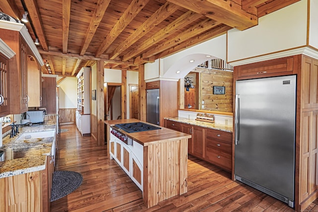 72 Indian Spring Rd, Woodstock, CT 06281 - kitchen with hardwood / wood-style flooring, beamed ceiling, butcher block countertops, stainless steel refrigerator, and stainless steel built in fridge