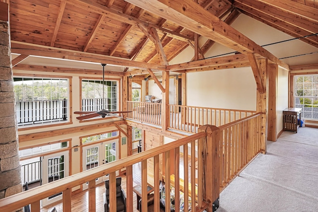 72 Indian Spring Rd, Woodstock, CT 06281 - corridor with high vaulted ceiling, beamed ceiling, carpet floors, and an upstairs landing