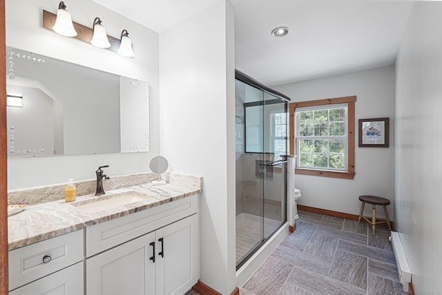 72 Indian Spring Rd, Woodstock, CT 06281 - full bath featuring recessed lighting, a shower stall, vanity, toilet, and baseboards