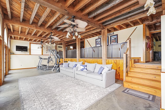 72 Indian Spring Rd, Woodstock, CT 06281 - living area with concrete flooring, stairway, and baseboards