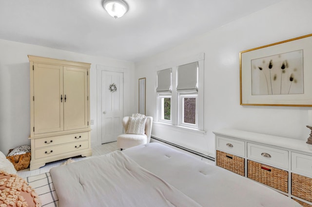 bedroom featuring baseboard heating