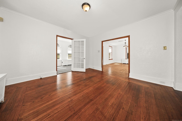 639 Cooke St, Waterbury, CT 06710 - empty room with crown molding, a wealth of natural light, and hardwood / wood-style floors