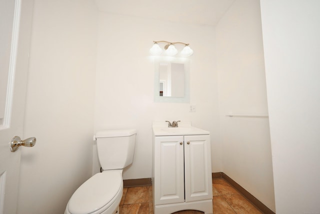 639 Cooke St, Waterbury, CT 06710 - bathroom featuring toilet, vanity, and baseboards